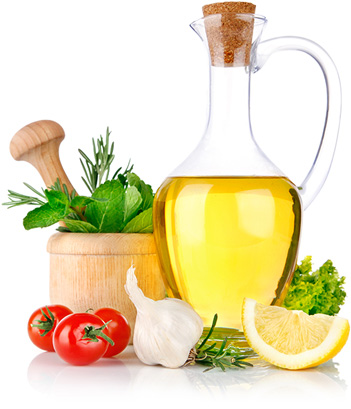 Olive oil with fresh herbs, tomatoes and lemon